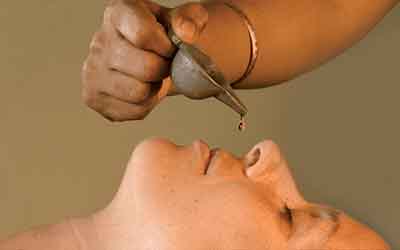 Nasyam therapy session